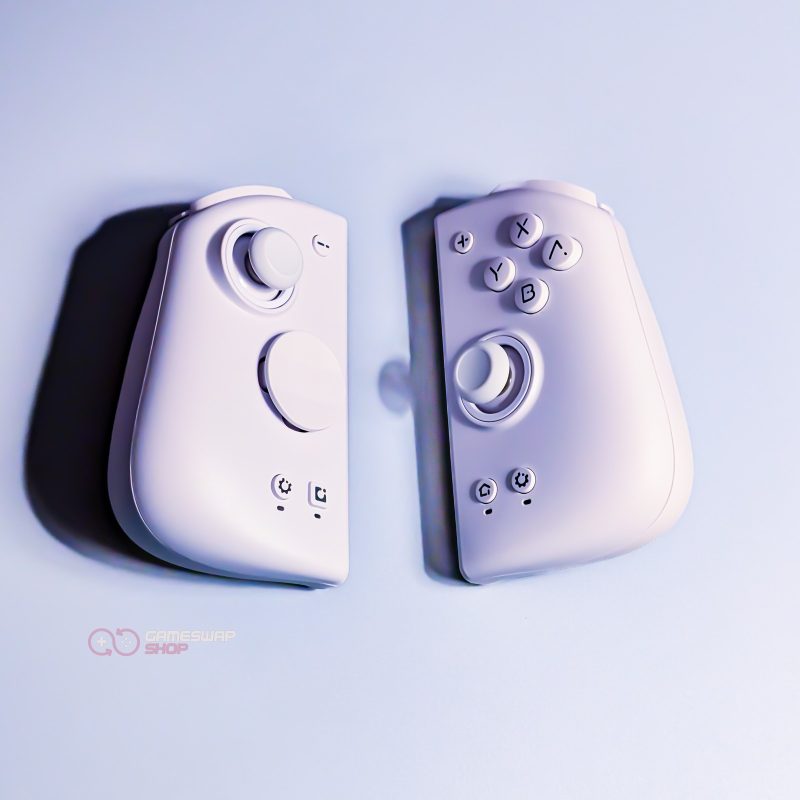 White gaming controllers on a light background.