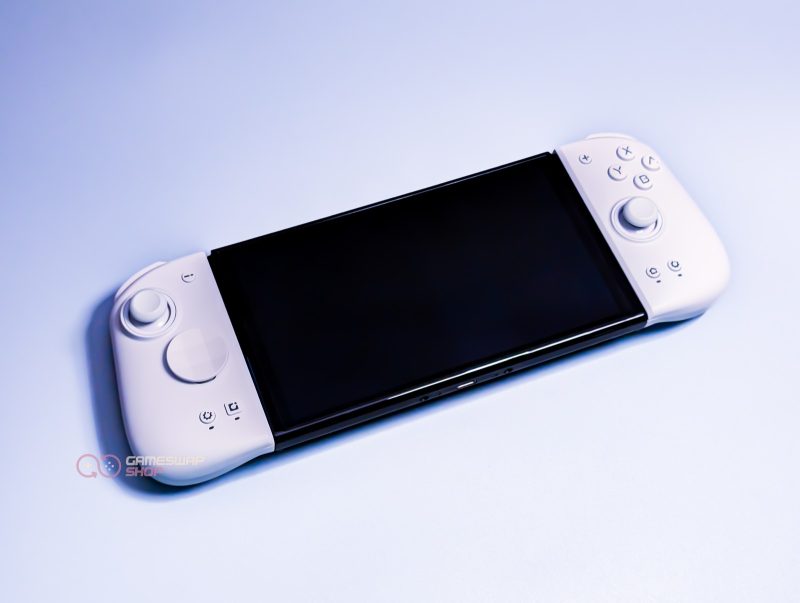 White handheld gaming console on light background.