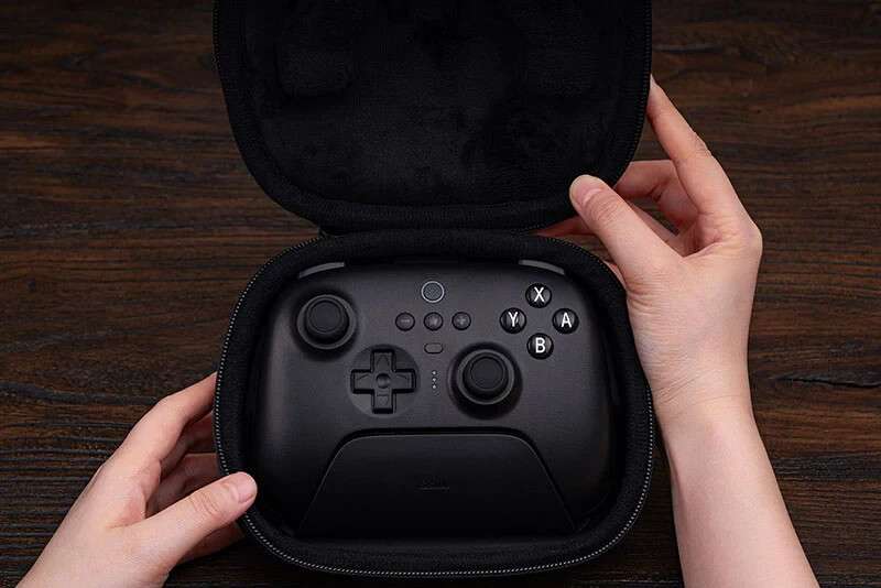 Game controller in protective carrying case.