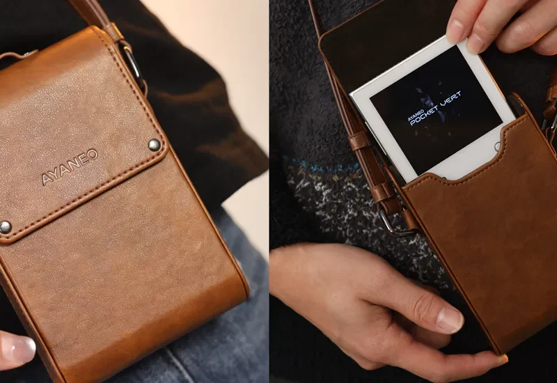 Brown leather case with portable device inside.
